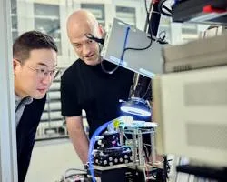 some researchers doing research in a quantum computing lab