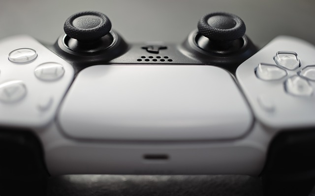 playstation controller in white and black color